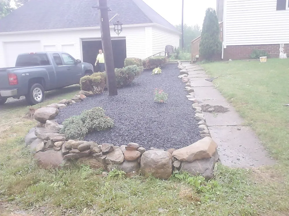 Custom yard maintenance for beautiful yards across Mebane, NC - Eco-Smart Rubber Mulch Systems