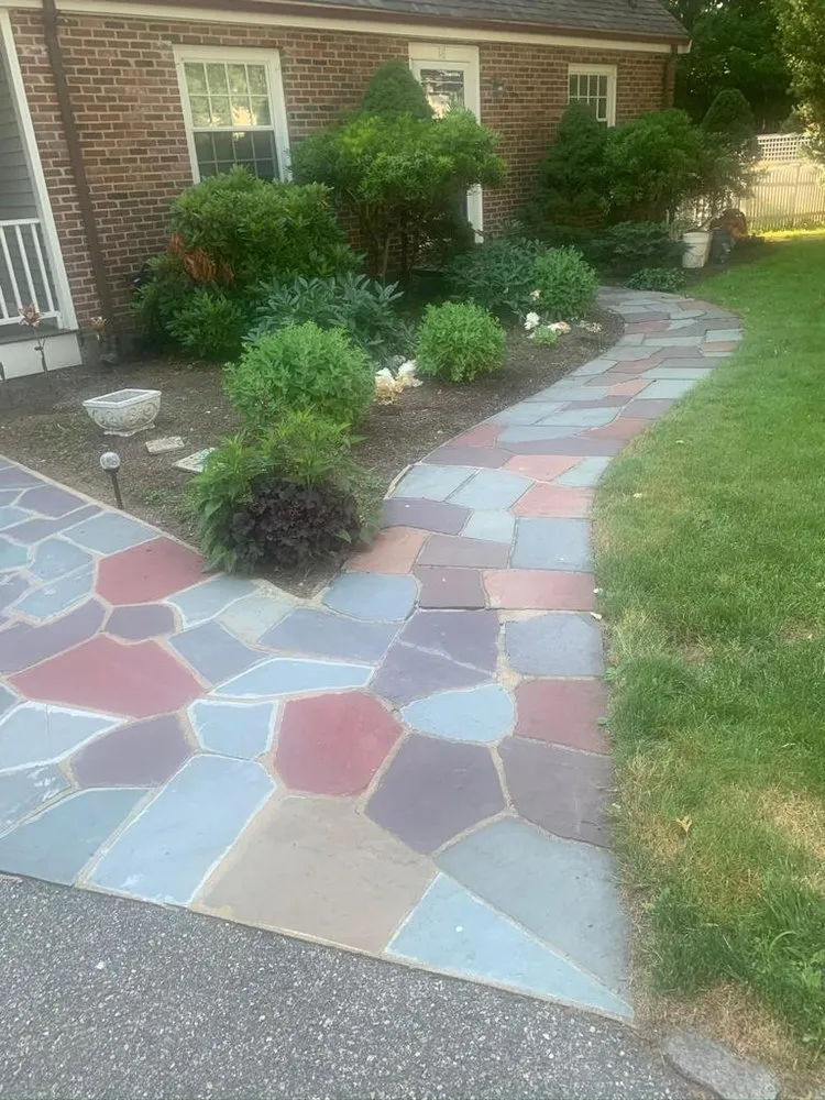 Professional yard cleanup service with custom design in Framingham, MA by Ecoland Landscaping & Masonry