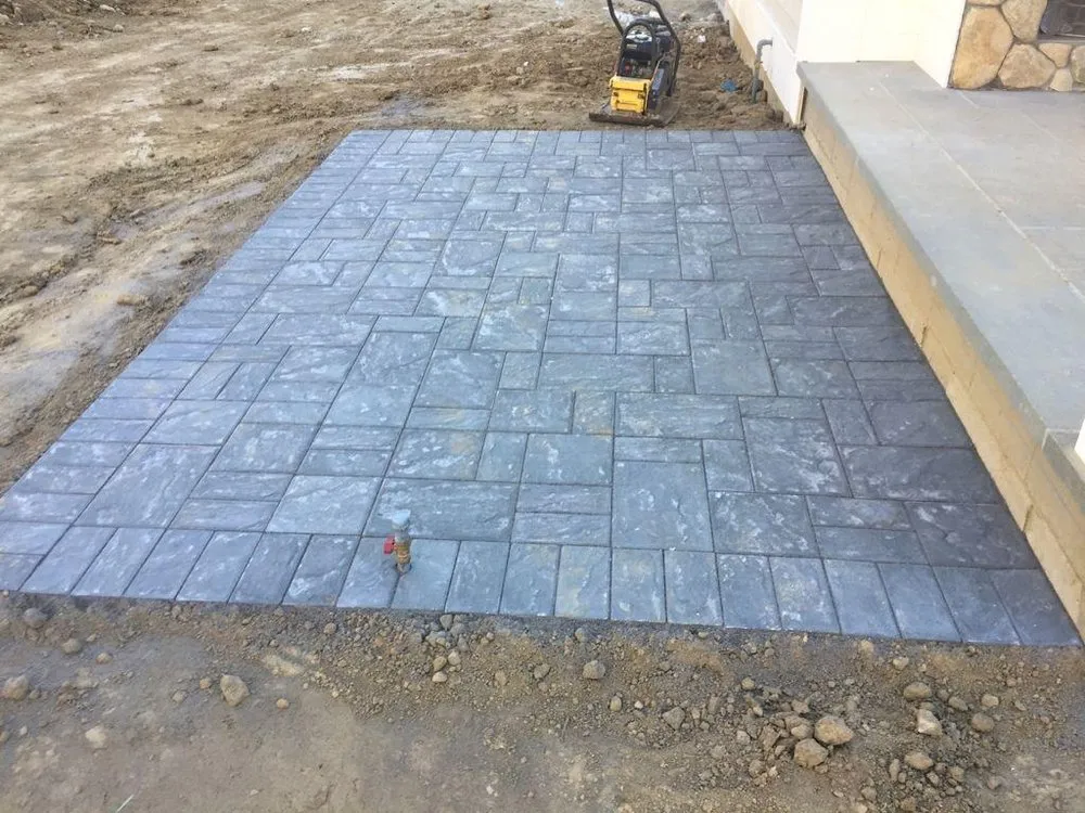 Reliable lawn care service in Framingham, MA by Ecoland Landscaping & Masonry