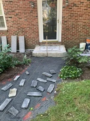 Ecoland Landscaping & Masonry Logo