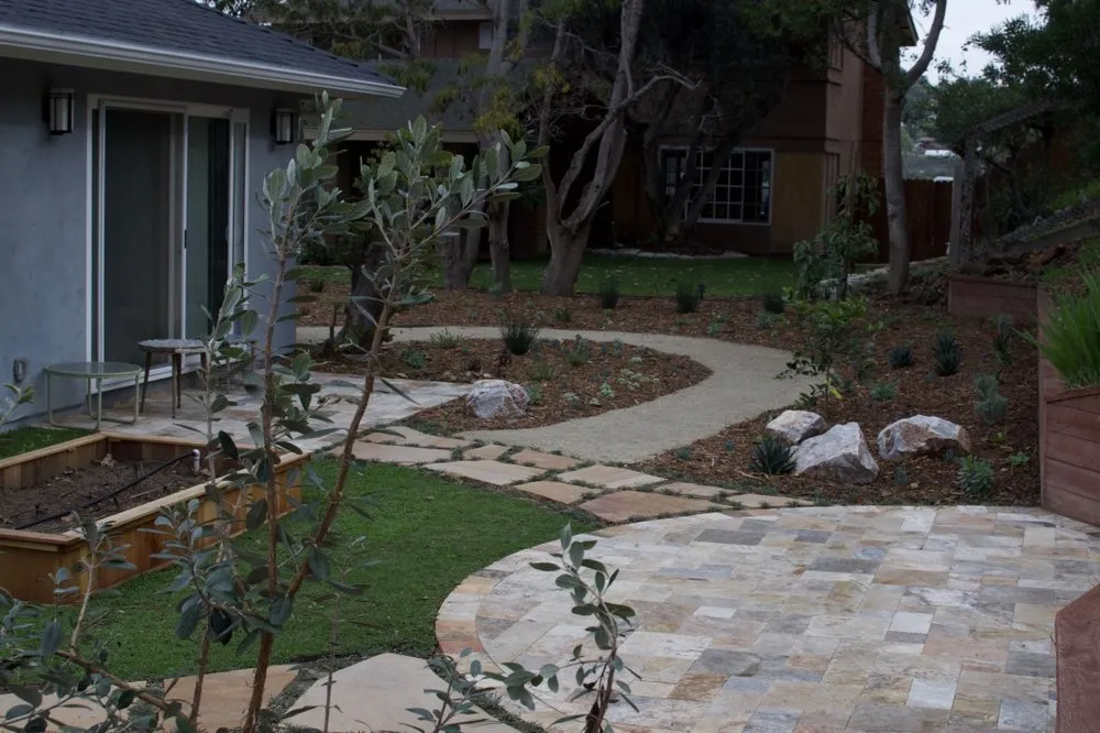 Custom lawn mowing service for residential properties in Encinitas, CA by Ecology Artisans