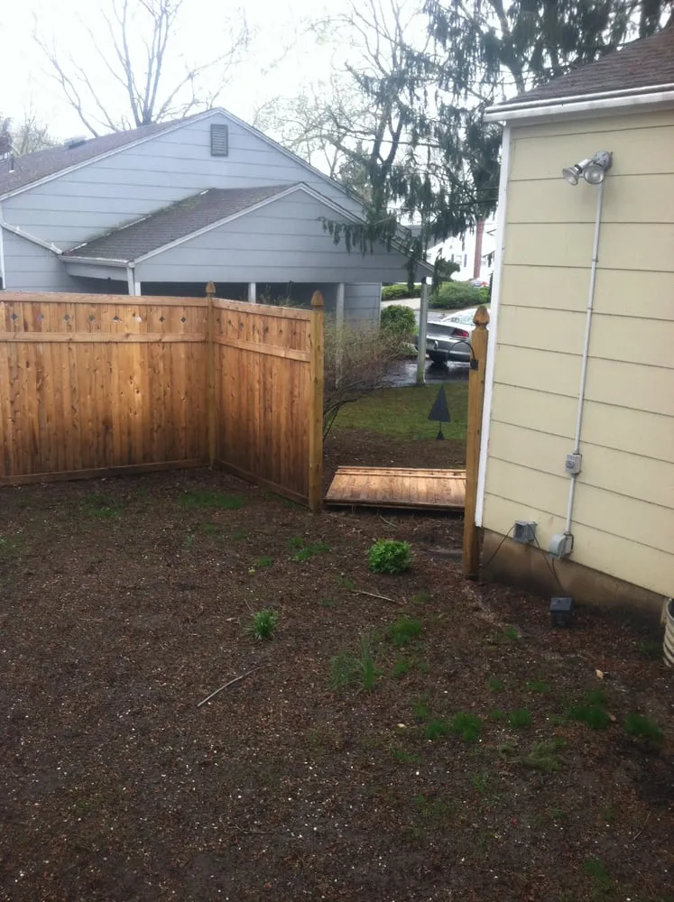 Professional lawn care service for residential properties in Freehold, NJ by Ecosystems Total Outdoor Solutions