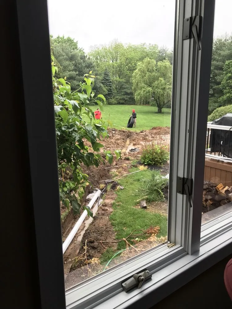 Custom lawn mowing service for residential properties across Freehold, NJ - Ecosystems Total Outdoor Solutions