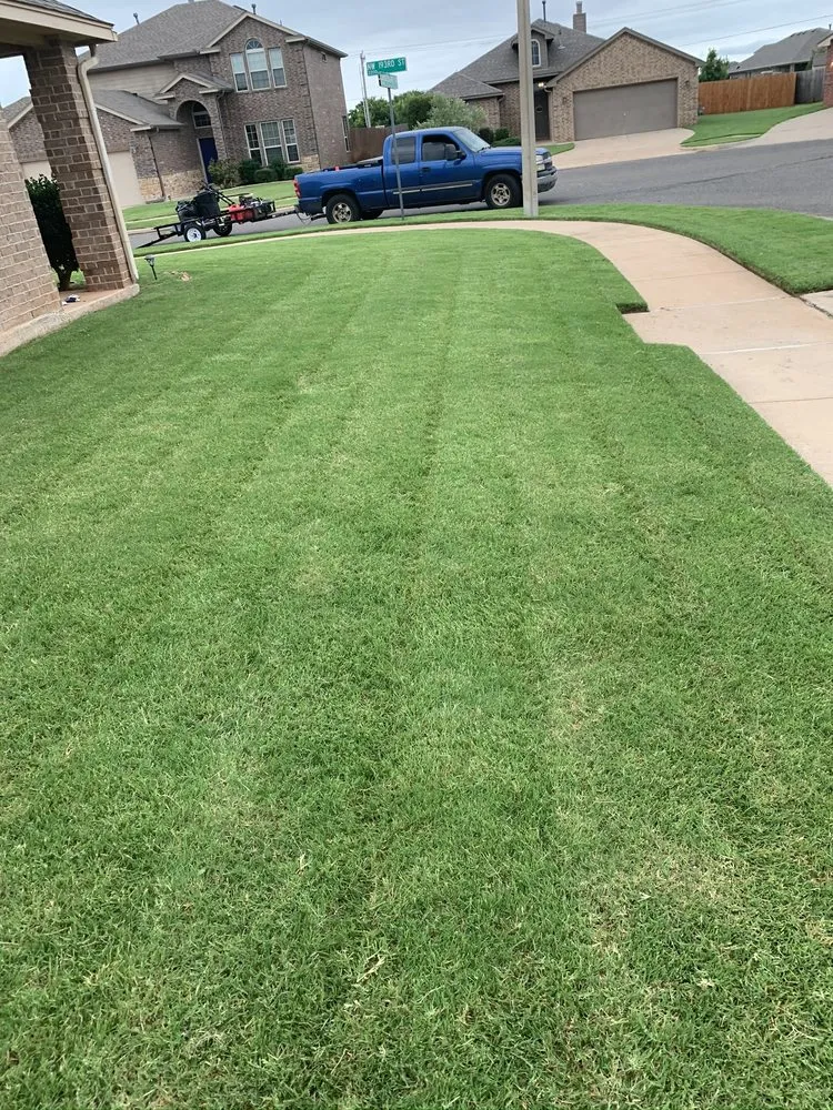 Affordable landscape design for year-round maintenance in El Reno, OK by E&C’s Brothers Lawn Service