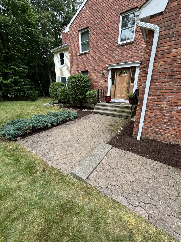 Affordable landscape design for homes in Norwalk, CT by Eddie & Partners