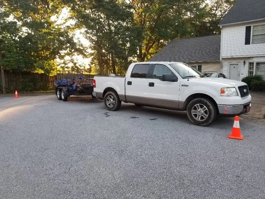 Eddie's Lawn Care and Landscaping Logo