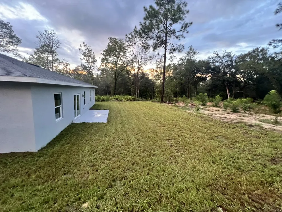 Custom outdoor landscaping for beautiful yards in Citrus Springs, FL by Eden Exteriors