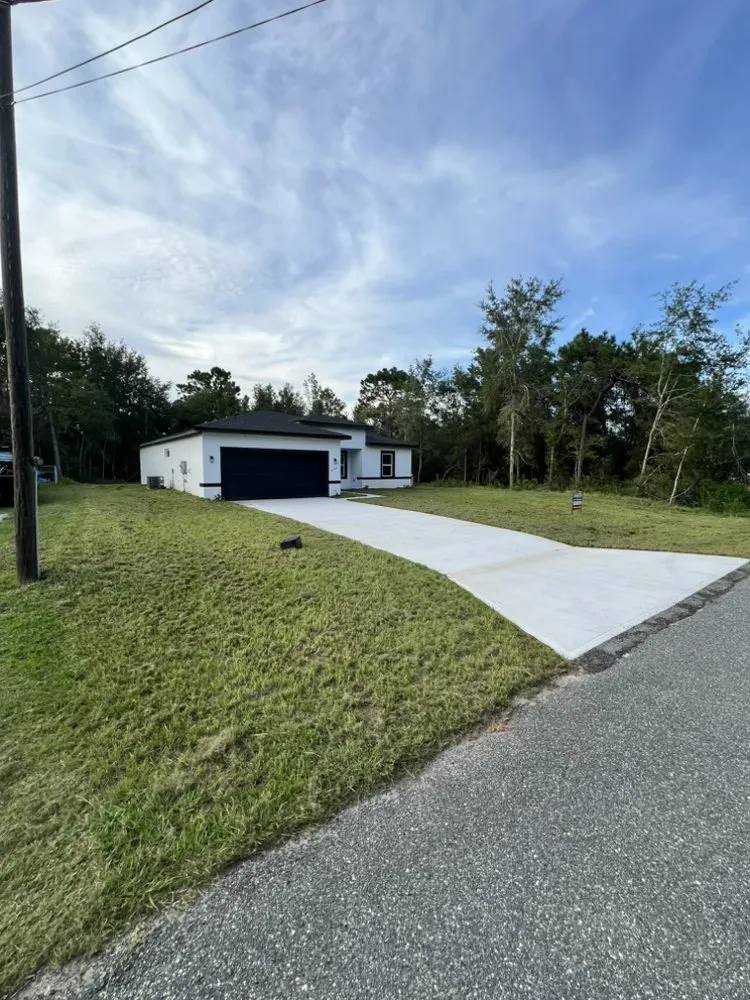 Professional yard maintenance for residential properties in Citrus Springs, FL by Eden Exteriors