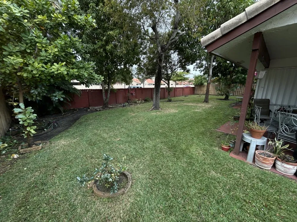 Professional lawn mowing service for homes in Miami, FL by Eden’s Lawn Care Services