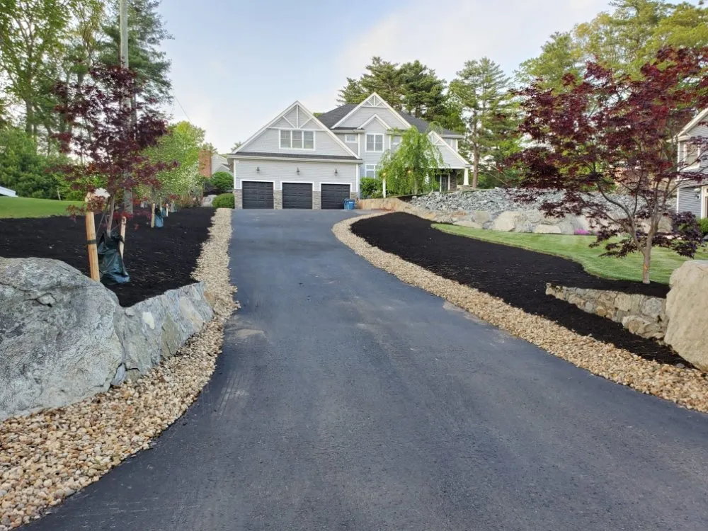 Local lawn care service for year-round maintenance in New Bedford, MA by Edgar lansdcaping