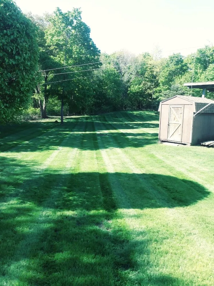 Custom lawn mowing service for year-round maintenance across New Bedford, MA - Edgar lansdcaping