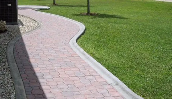 Affordable lawn mowing service in Saint John, IN by Edge Crafters