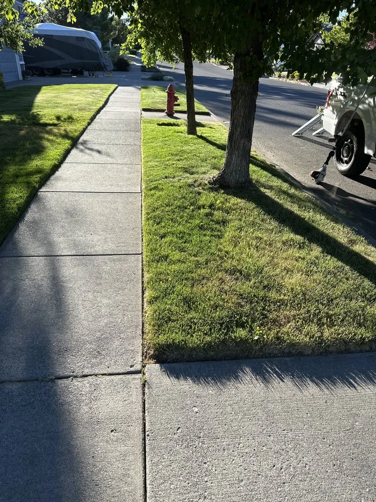 Professional lawn mowing service for residential properties in Bend, OR by Edge Landscaping