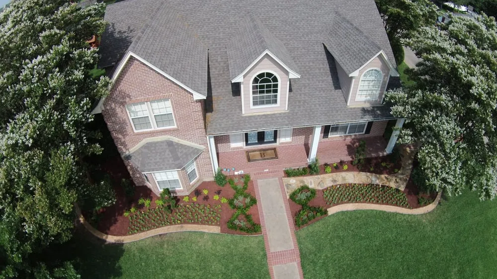 Custom landscape installation for year-round maintenance in Victoria, TX by Edge Landscaping