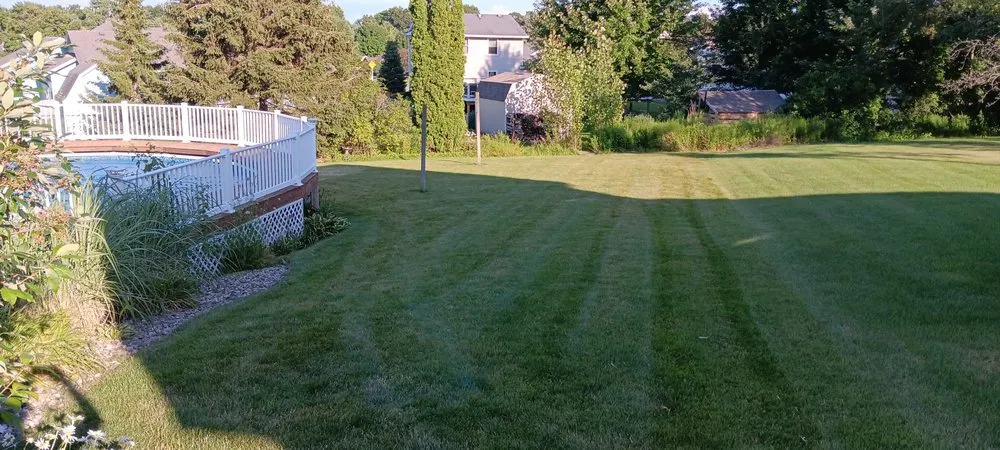 Expert landscape installation for homes in Byron Center, MI by Edge To Edge Services