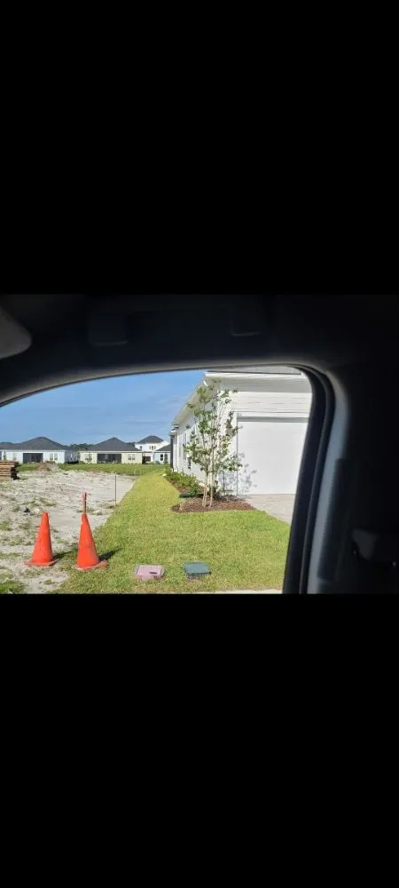 Professional landscape installation with custom design in Saint Augustine, FL by Edgepoint Lawn and Tractor