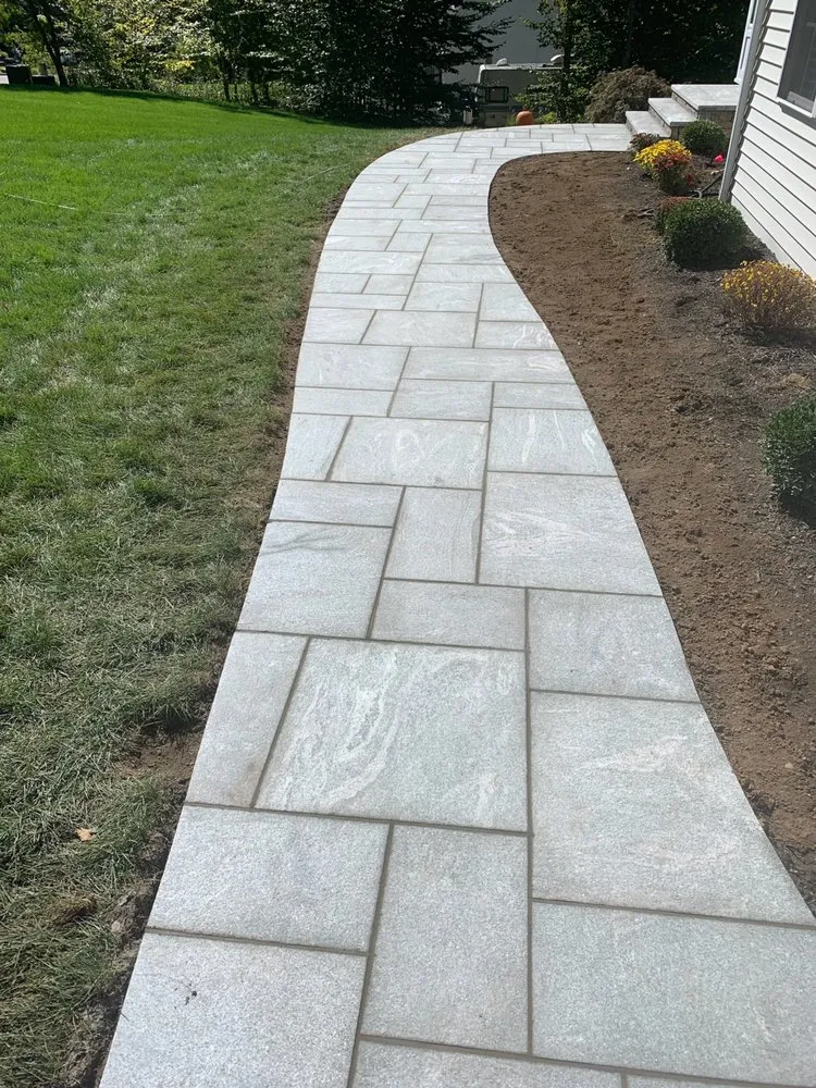 Reliable yard maintenance for year-round maintenance across Bridgeport, CT - Edland Landscaping