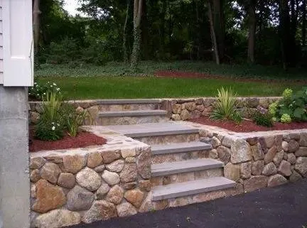 Professional landscape installation for residential properties in Natick, MA by Ed's Landscaping & Tree Service
