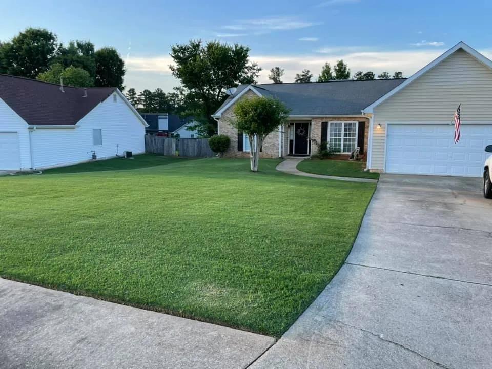 Professional lawn care service for homes in Hampton, GA by Ed’s Lawn Service