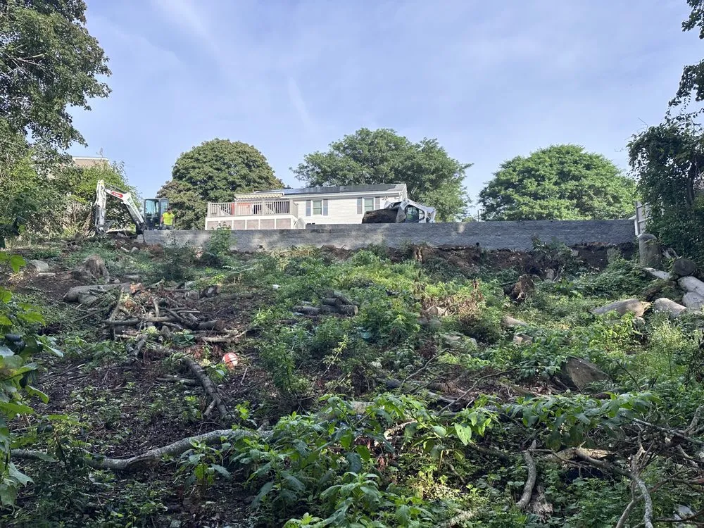 Expert lawn mowing service for year-round maintenance in Lynn, MA by Eduardo's Construction & Paving