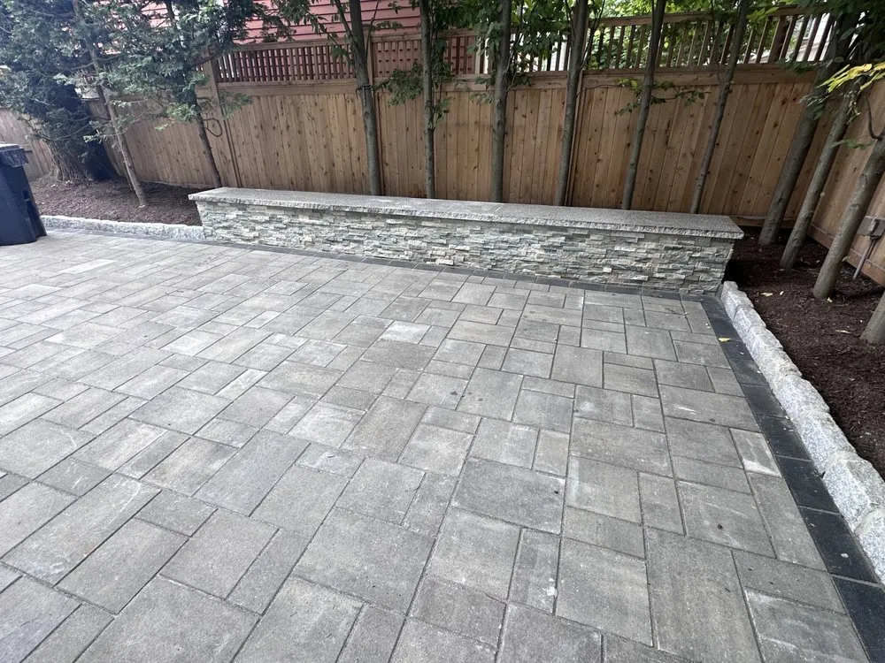 Affordable yard cleanup service for outdoor upgrades in Lynn, MA by Eduardo's Construction & Paving