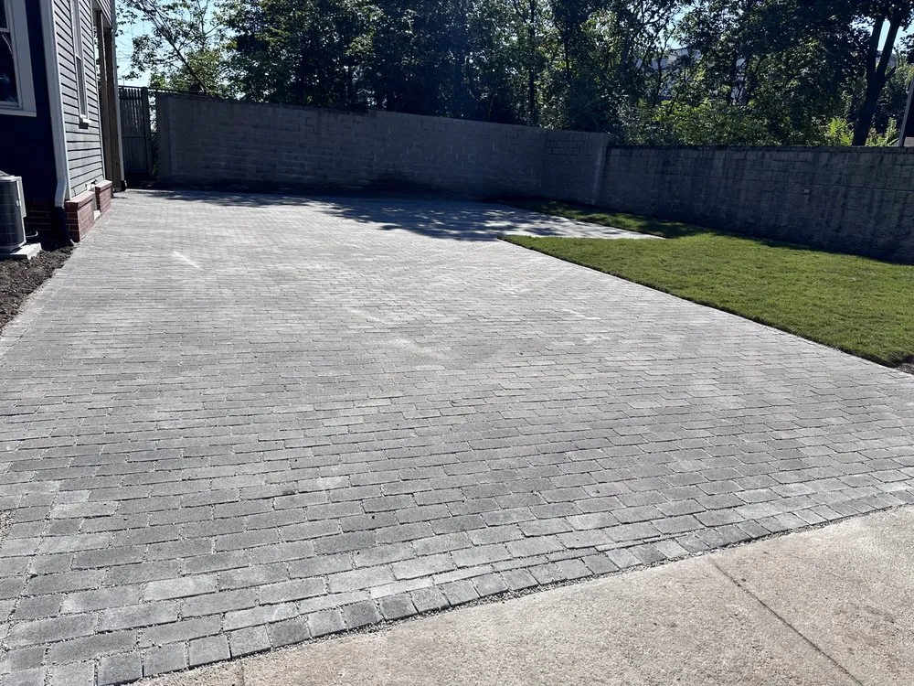 Expert lawn mowing service for beautiful yards in Lynn, MA by Eduardo's Construction & Paving