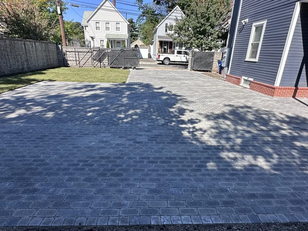 Professional lawn mowing service in Lynn, MA by Eduardo's Construction & Paving