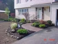 Expert yard maintenance for homes in Webster, NY by Educated Landscape