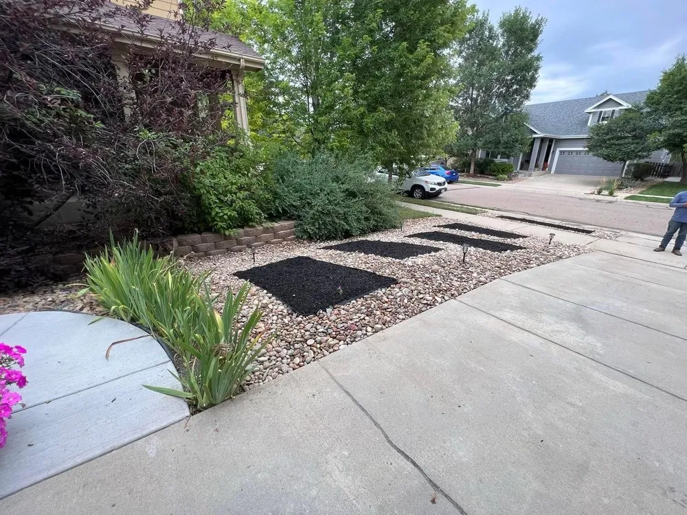Expert lawn care service for homes in Brighton, CO by E•E Construction