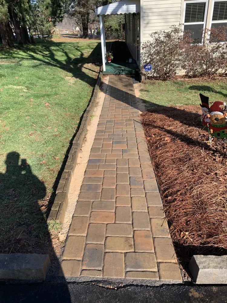 Professional residential landscaping for year-round maintenance in Lewisville, NC by E&E Landscape Solutions