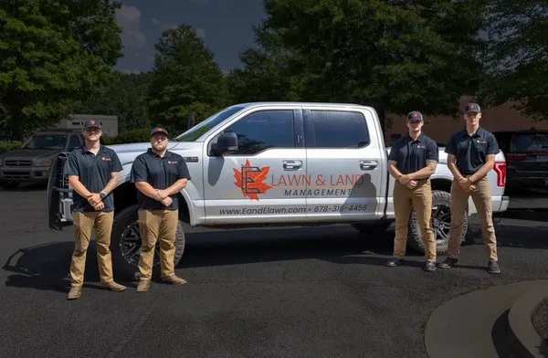 E&E Lawn & Land Management Logo