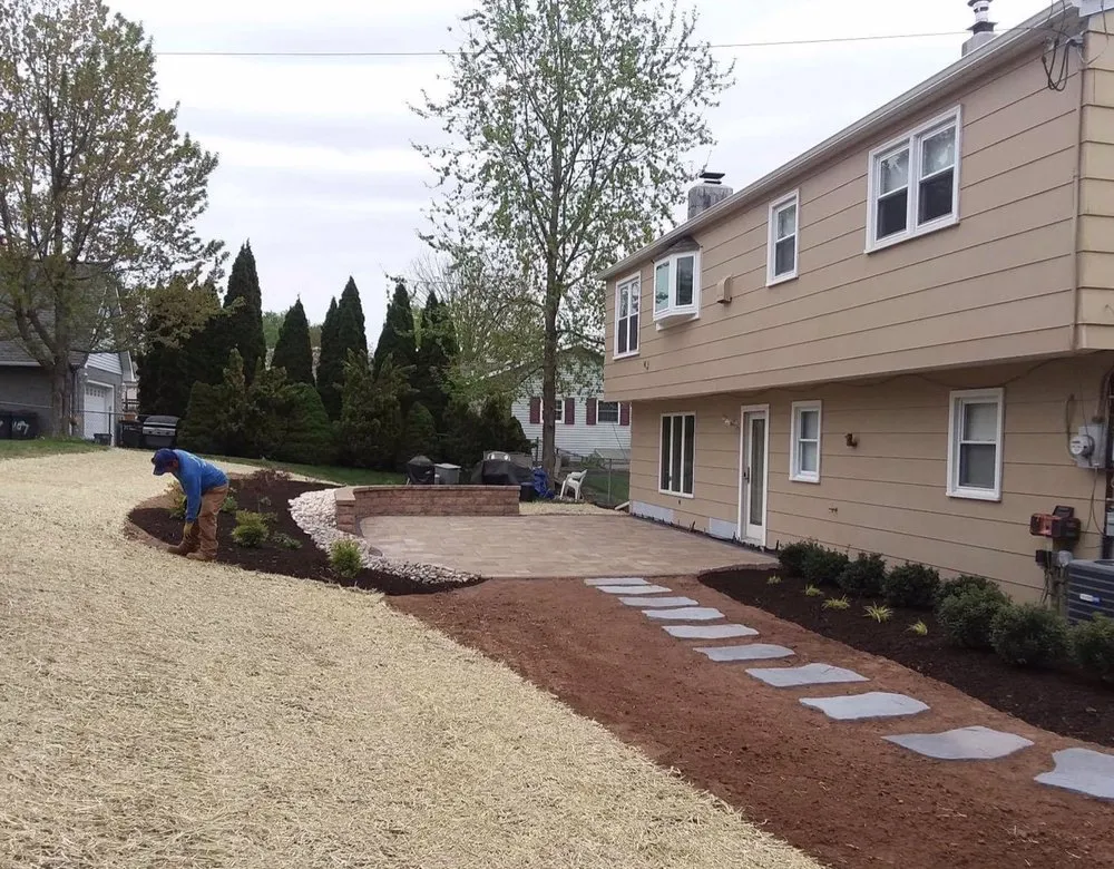 Professional yard cleanup service for year-round maintenance in Warminster, PA by E&F Landscape