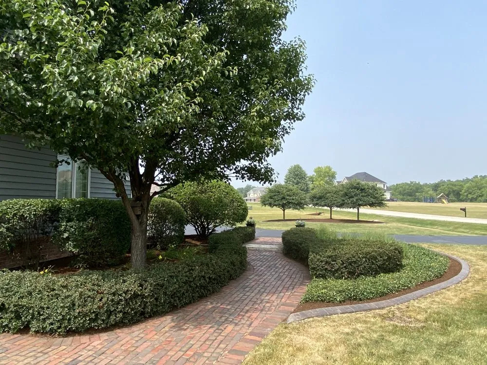 Reliable lawn mowing service for residential properties in McHenry, IL by E.F.P. Express Landscaping Service