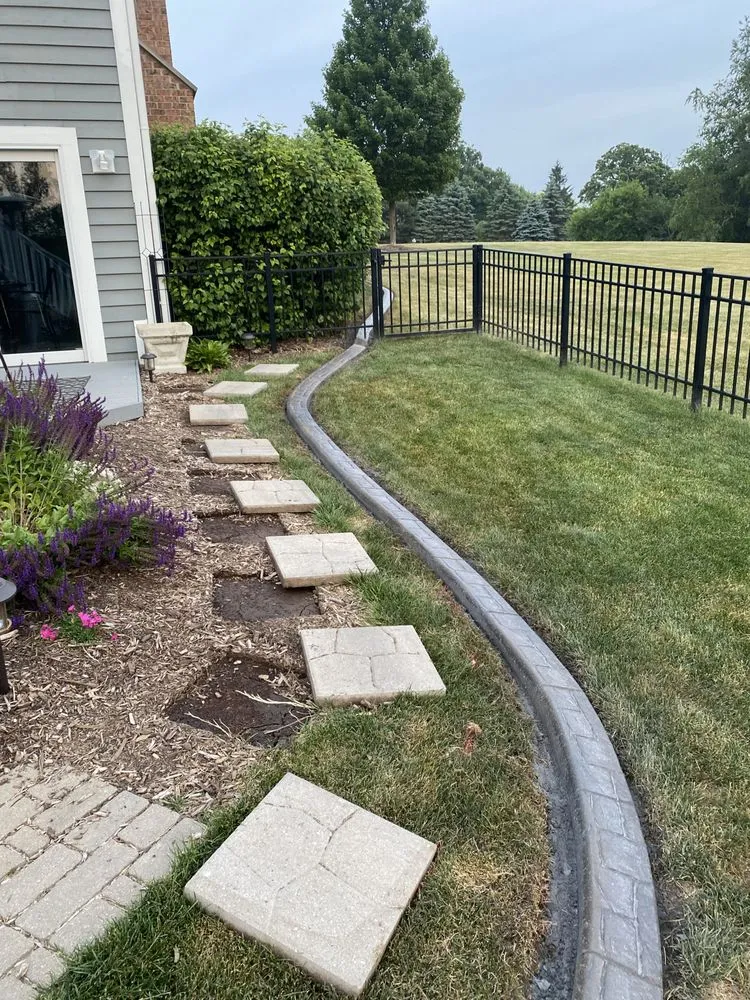 Affordable lawn mowing service for year-round maintenance in McHenry, IL by E.F.P. Express Landscaping Service