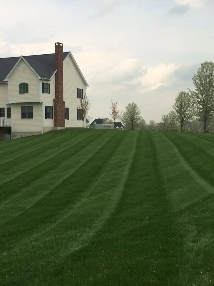 Professional lawn mowing service in New Fairfield, CT by Eight 4 Five Services