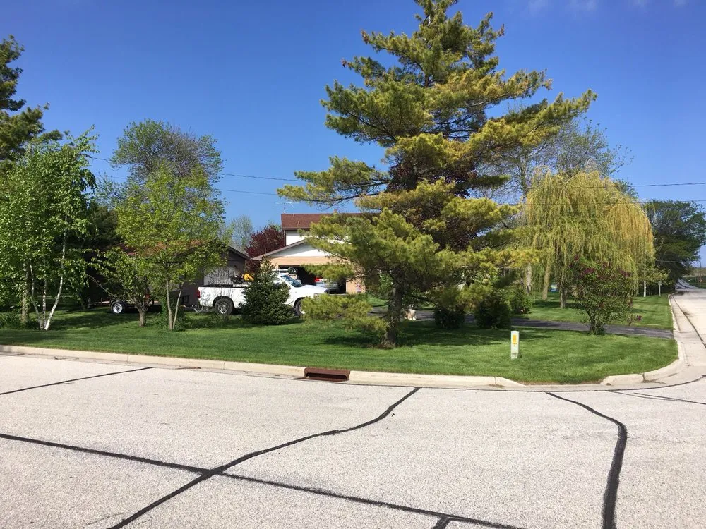 Custom yard cleanup service with custom design across Howards Grove, WI - Eisentraut Lawn Care