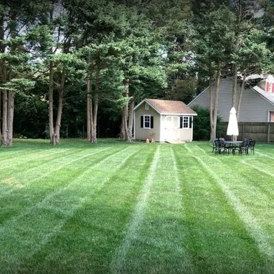 E&J Landscaping and Lawn Maintenance Logo