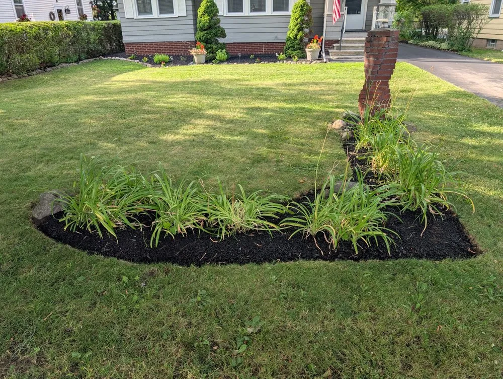 Expert garden landscaping for year-round maintenance in Irondequoit, NY by EJ Lawn & Landscape