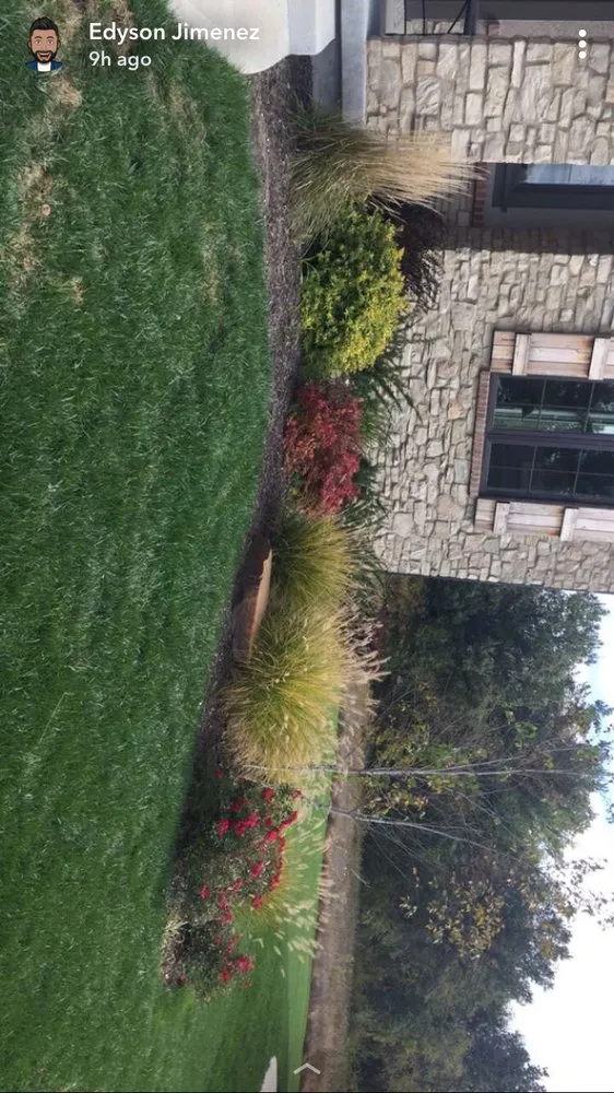 Expert lawn mowing service for homes in Lenexa, KS by EJQ Landscape & Tree Services