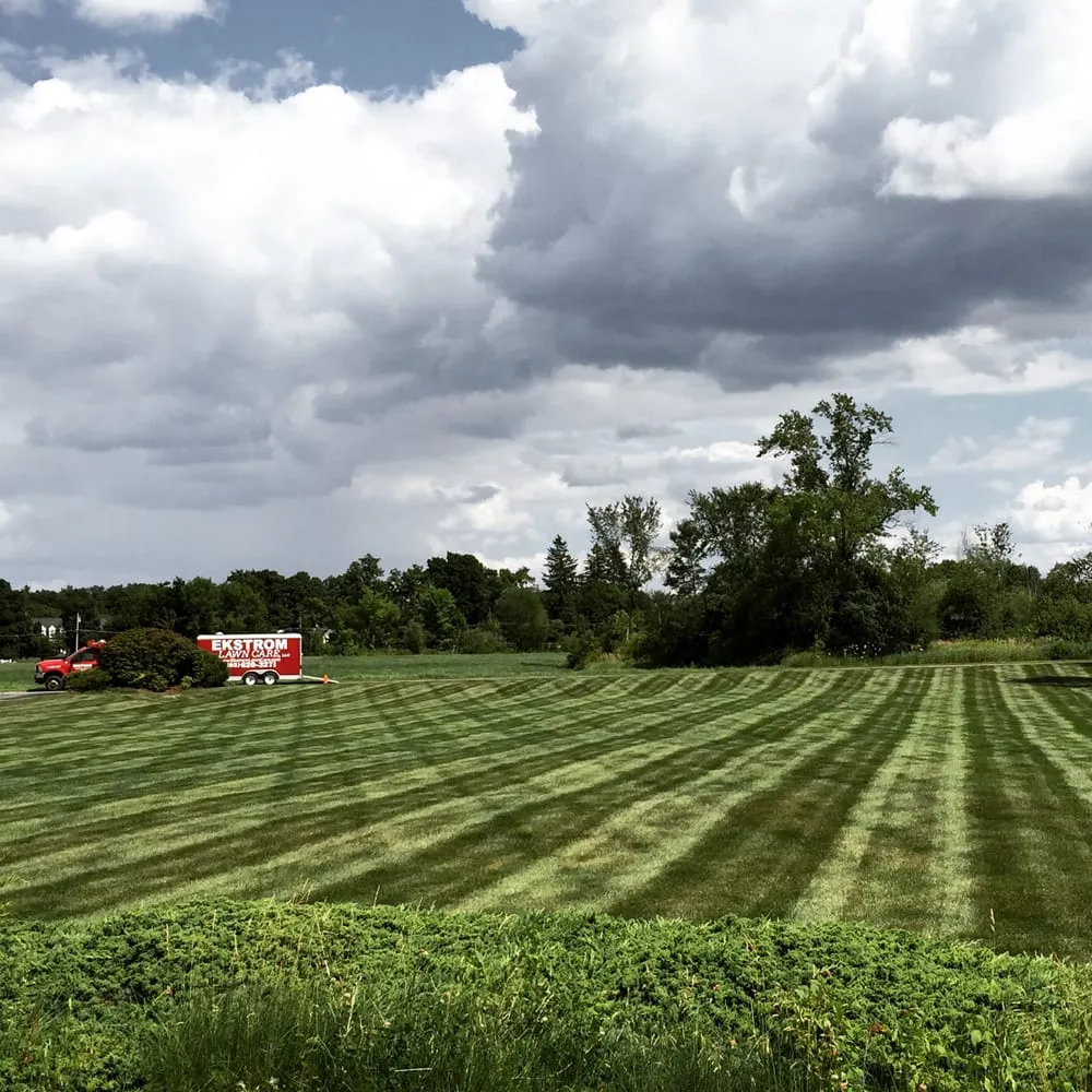 Custom residential landscaping for year-round maintenance in Amherst, NH by Ekstrom Lawn Care