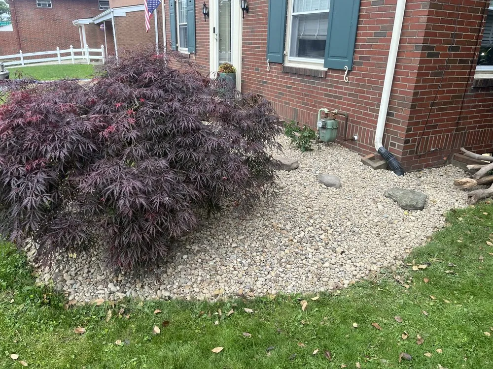 Trusted yard cleanup service with custom design in Avonmore, PA by E.L.C. Lawncare & Landscaping