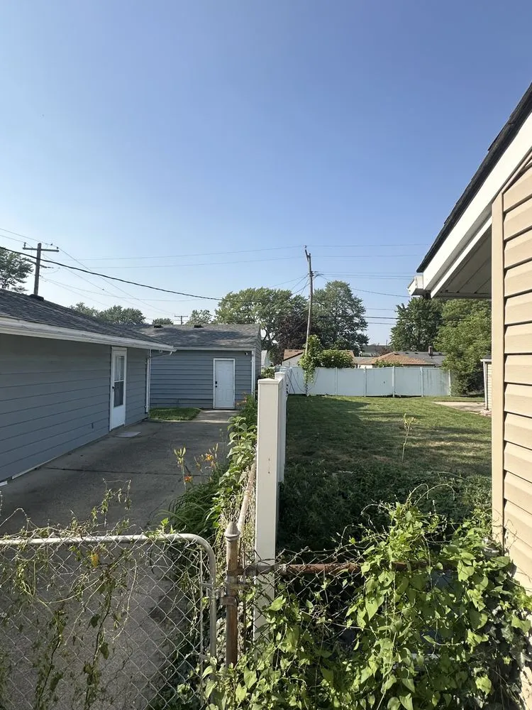 Custom landscape design for outdoor upgrades in Redford Township, MI by Elcortez Lawn Care