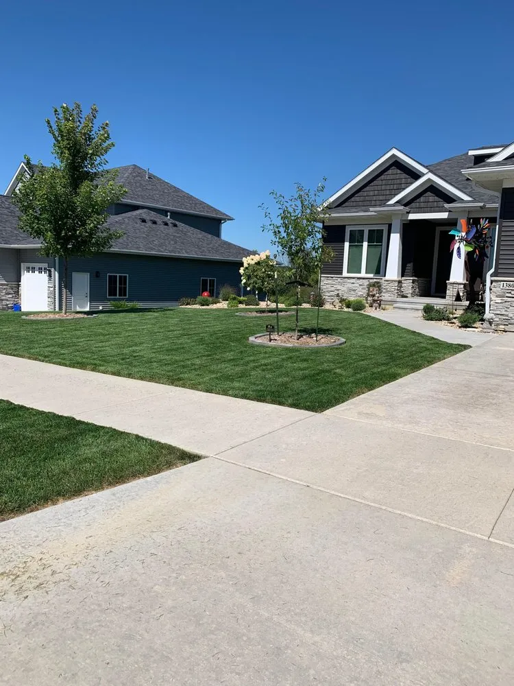 Top-rated lawn mowing service for year-round maintenance across Iowa City, IA - Electric Lawn