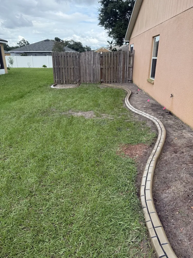 Custom outdoor landscaping in Auburndale, FL by Elegant Curbing & Hardscapes