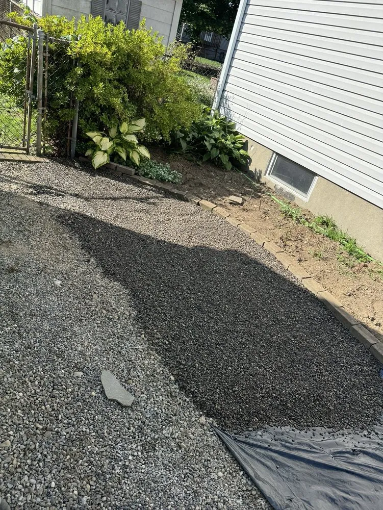 Custom lawn mowing service for outdoor upgrades in Cortland, NY by Elegant Flowers Lawn Care & Services