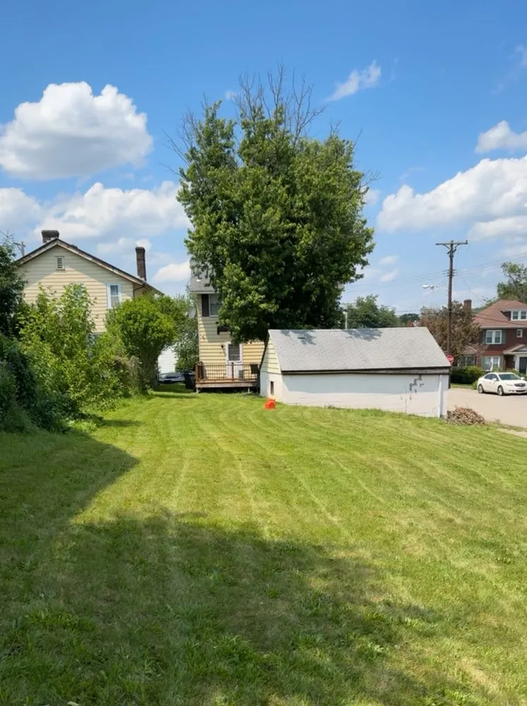 Custom landscape design in Ambridge, PA - Elegant grass enhancement