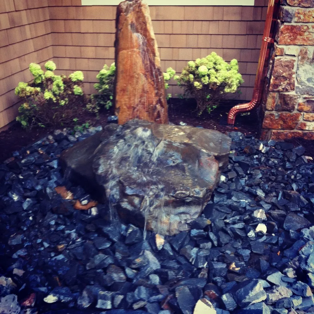 Custom landscaping services for year-round maintenance across Norwood Young America, MN - Elegant Outdoors