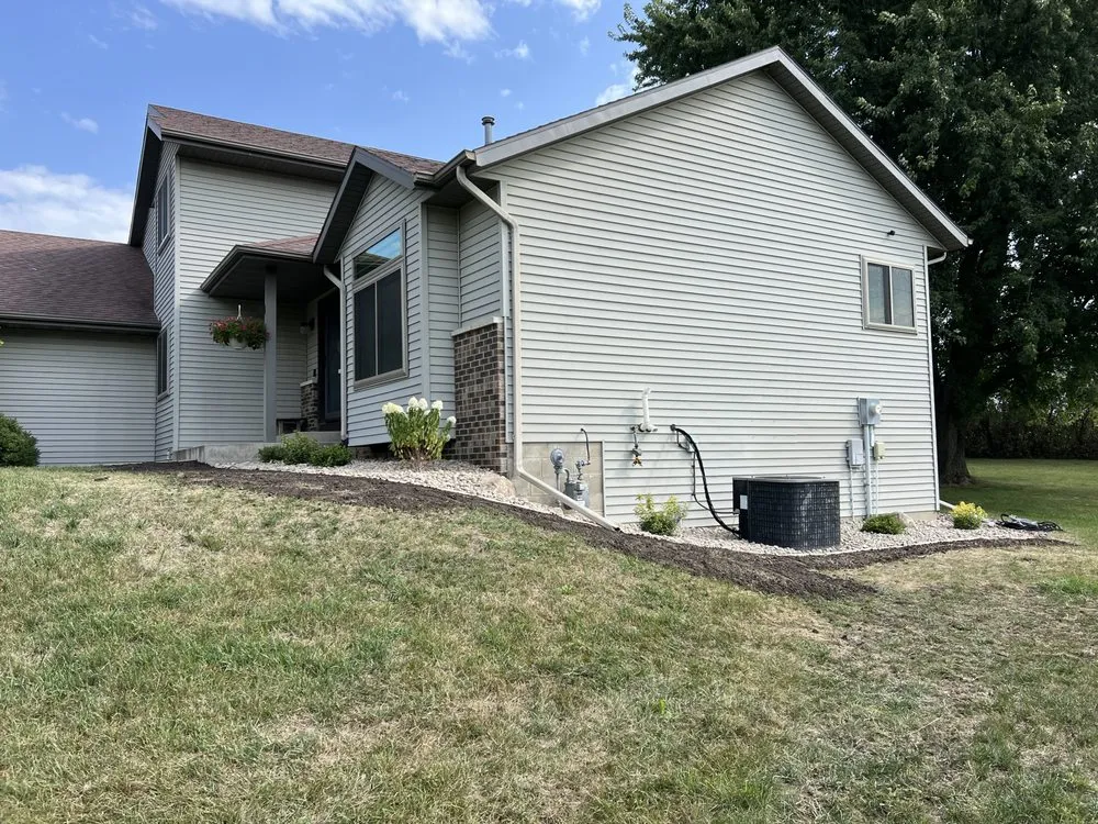 Affordable lawn care service in Rochester, MN by Elevated Hardscapes