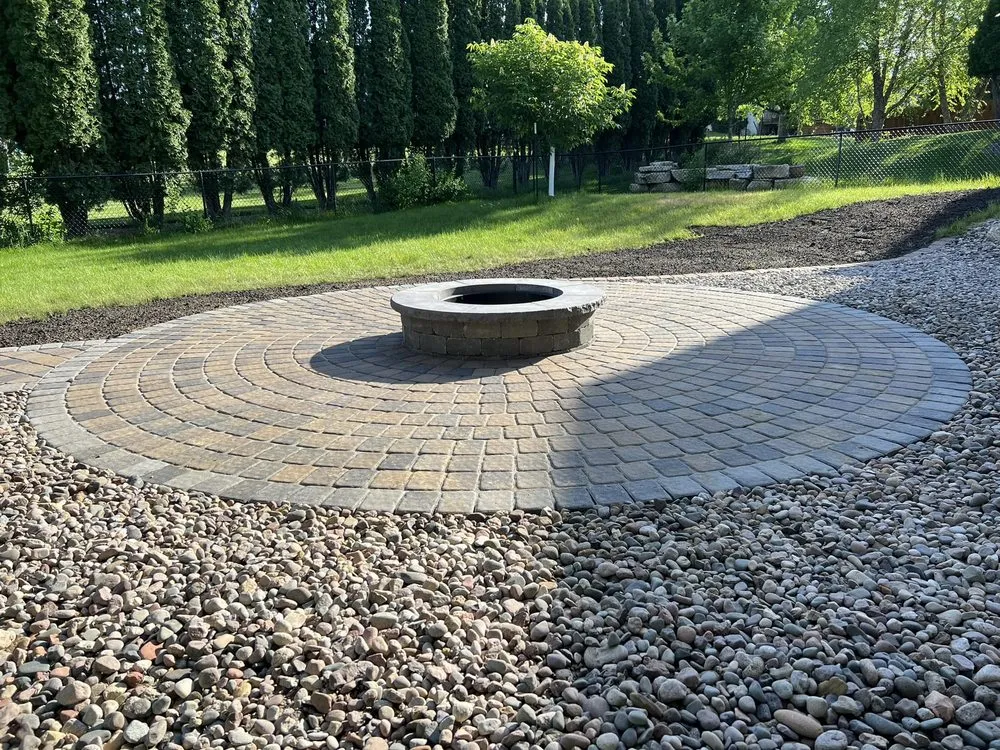 Reliable lawn mowing service with custom design in Rochester, MN by Elevated Hardscapes