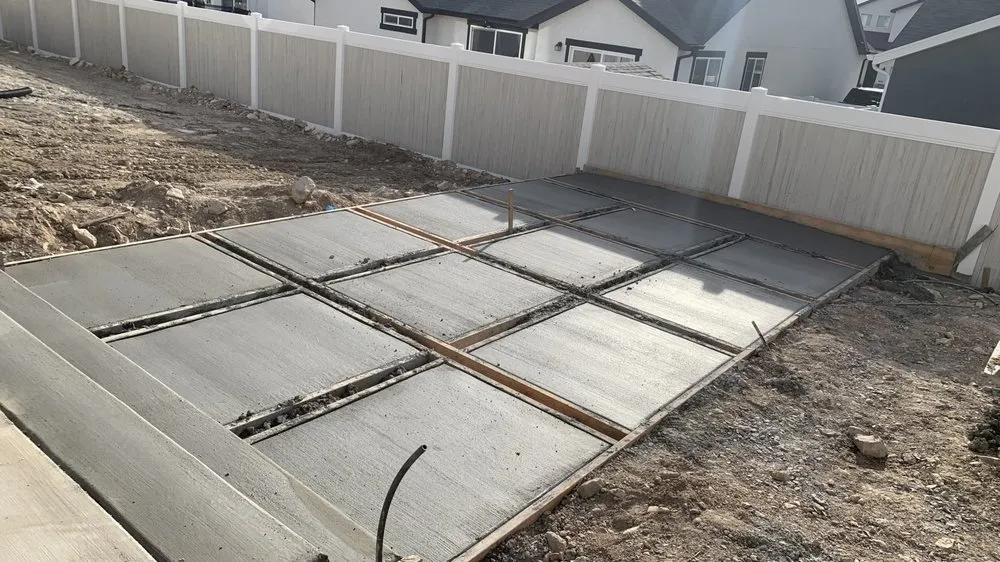 Custom landscape design with custom design in Spanish Fork, UT by Elevated Landscaping & Concrete